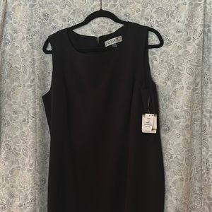 Classic dress for work or evening. Never worn.